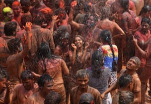 A crowd dances in artificial rain in Hyderabad,
