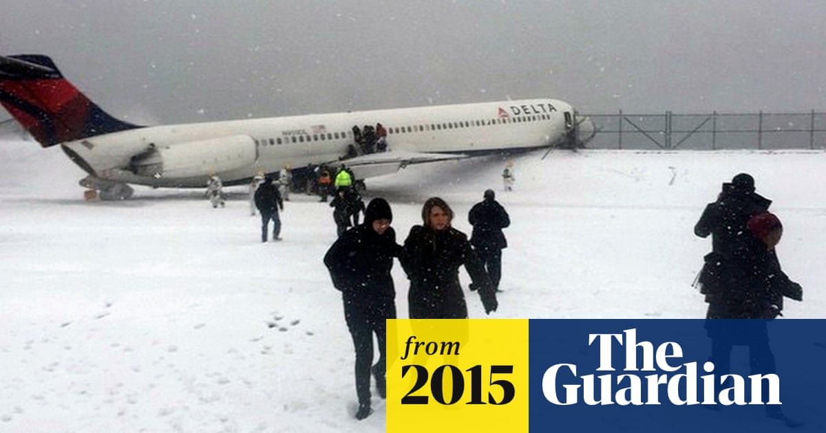 Plane Skids Off Snowy Runway At New York S Laguardia Airport World News The Guardian