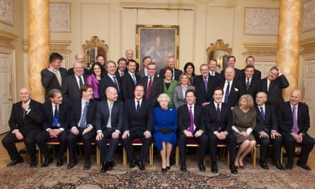 The queen flanked by David Cameron and Nick Clegg, and the rest of the Conservative-Lib Dem coalition cabinet, in 2012.