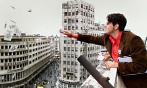 A Belgrade student throws leaflets from a rooftop as part of the 2000 protests against Slobodan Mil