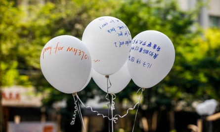 Balloons with messages for the passengers of missing flight MH370 during a ceremony in Kuala Lumpur.