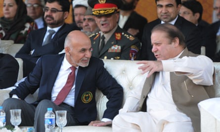 Ashraf Ghani, left, and Pakistani prime minister Nawaz Sharif watch cricket together in Islamabad, November 2014.