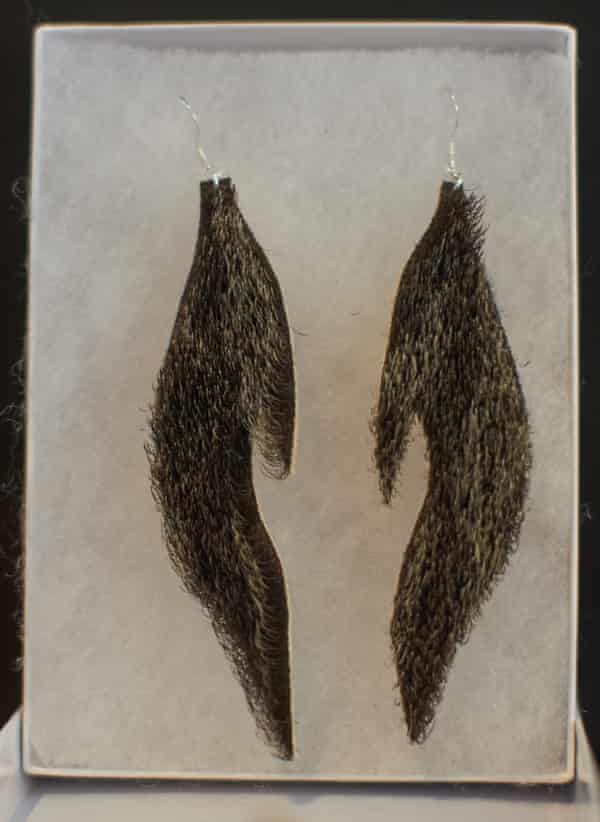 Sea otter earrings by Peter Williams.