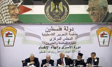 Mahmoud Abbas, centre, speaks at a meeting of he Palestinian Authority's top decision-making body.