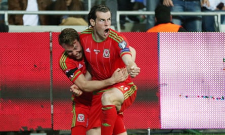 Football - Israel v Wales - UEFA Euro 2016 Qualifying Group B - Haifa International Stadium, Haifa, Israel - 28/3/15 Gareth Bale celebrates with team mates after scoring the second goal for Wales  Action Images via Reuters / Matthew Childs Livepic EDITORIAL USE ONLY.2015Soccer