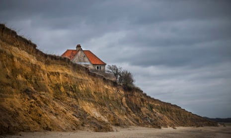 A house on the edge of the cliffs at Easton Bavents, Southwold, Suffolk.