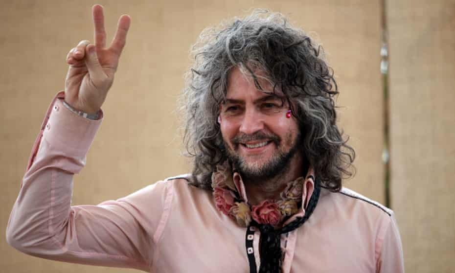 Wayne Coyne, lead singer, guitarist, and songwriter for the U.S. band the Flaming Lips, poses for photos during an interview before performing at the 2015 Cumbre Tajin music festival in Papantla, Mexico, Friday, March 20, 2015. (AP Photo/Felix Marquez)