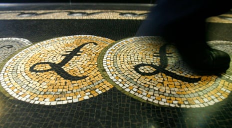 A mosaic of pound sterling symbols set in the floor of the front hall of the Bank of England.