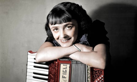 Edith Piaf, with an accordion, in 1936.