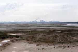 A toxic lake of mine and refinery tailings stretch for over 6km from Baogang Iron and Steel Corporation.  10 sq km toxic tailings lake  whereby 1 Tonne of Rare earth  produces  75 tonnes of acidic waste water, a cocktail of acids, heavy metals, carcinogens and radioactive material at3 times background radiation.