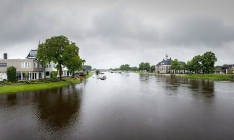 Boats in the flooded Vecht river following heavy rainfalls, in Ommen, Netherlands in May 2014.