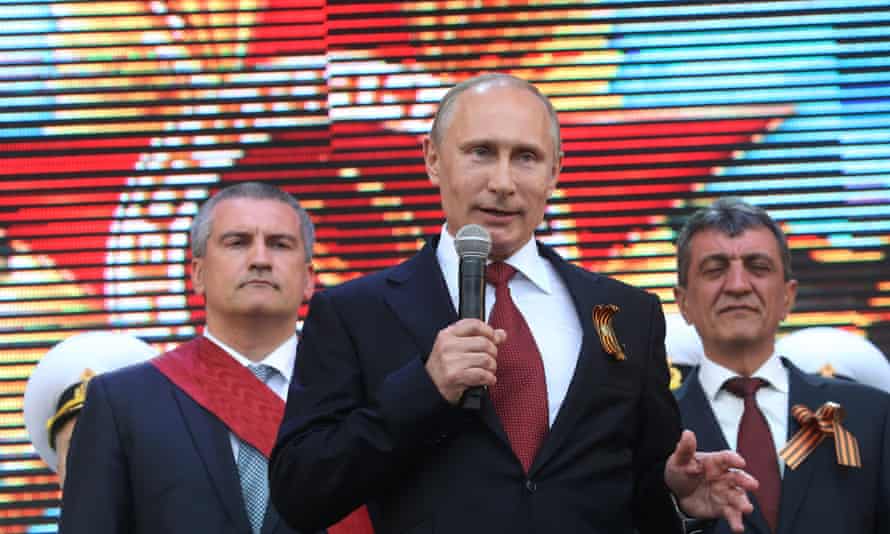Vladimir Putin addresses a Victory Day parade in Sevastopol