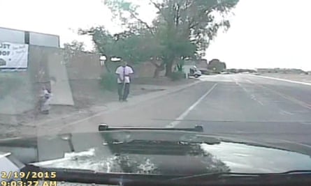 Dash-cam video provided by the Marana Police Department shows Mario Valencia facing a police vehicle in Marana.