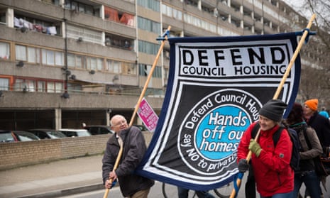 Social housing activists march through the Aylesbury Estate protesting against private investment and a lack of social housing in Southwark, south-east London.