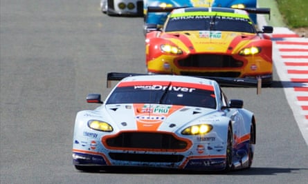 Racing demons: Aston Martins go through their paces.