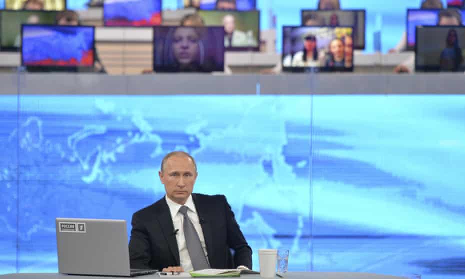 The Russian president, Vladimir Putin, takes part in a live call-in in Moscow.