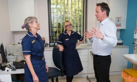 Prime Minister David Cameron meets nurses at the health centre.