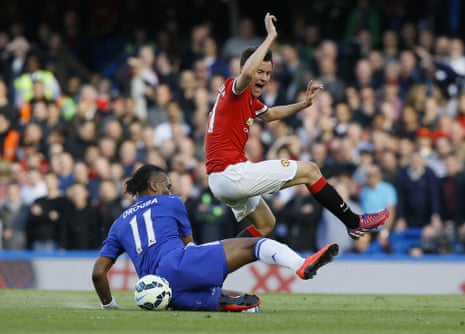 Didier Drogba vies for the ball with Manchester United's Ander Herrera.