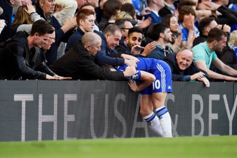 Hazard is consoled by the Chelsea faithful after that missed opportunity.