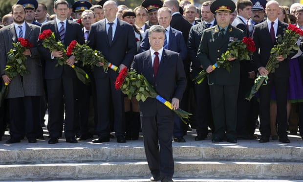 Ukrainian president Petro Poroshenko lays flowers at a memorial to the unknown sailor in Odessa.