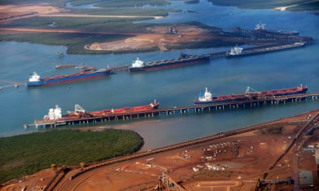 Bulk carriers are loaded with iron ore at Port Hedland in the Pilbara.