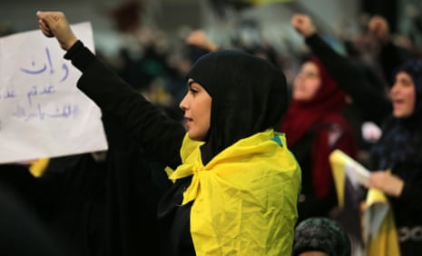 A Shia supporter shouts slogans during a Hezbollah meeting in Beirut.