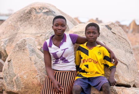 Cecilia Abanga and her brother Ayabil, who does not go to school because there is no money to send him