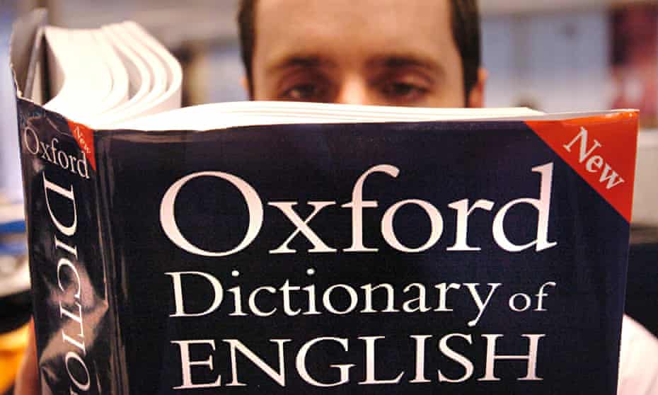 Man reading English dictionary