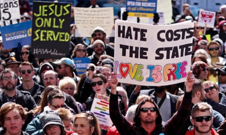 Demonstrators gather at Monument Circle to protest a controversial religious freedom bill recently signed by Governor Mike Pence, during a rally in Indianapolis March 28, 2015.  More than 2,000 people gathered at the Indiana State Capital Saturday to protest Indiana s newly signed Religious Freedom Restoration Act saying it would promote discrimination against individuals based on sexual orientation.  REUTERS/Nate Chute