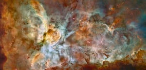 This view of the Carina Nebula shows star birth in a new level of detail. The fantastical landscape of the nebula is shaped by the action of outflowing winds and ultraviolet radiation from the massive stars that inhabit this inferno. These stars are shredding last vestiges of the giant cloud from which they were born. 