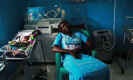 A woman sleeps next to her newborn baby in a nursery in Juba, South Sudan - the country with the highest maternal mortality rate in the world.
