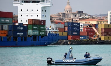 Police at Catania await the arrival of 27 migrants who survived the shipwreck.