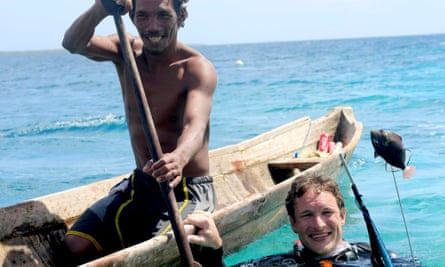 Will Millard with Kabei during a spear fishing expedition in the waters around Sampela village, Sulawesi.