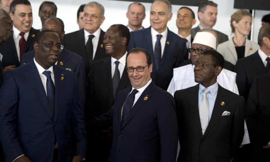 French president François Hollande (centre) speaks with Senegal’s president, Macky Sall (left), at a meeting of heads of state at the 15th summit of the International Organisation of French-speaking countries, November 2014, in Dakar.
