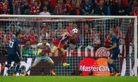 Robert Lewandowski scores Bayern Munich's third goal in the Champions League quarter-final second leg against Porto.