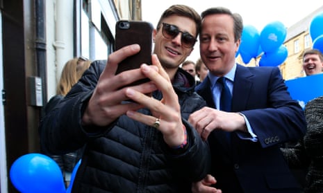 David Cameron poses for a selfie photograph 