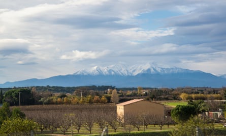 Landscape with the Pyrenees mountains taken from a train in France