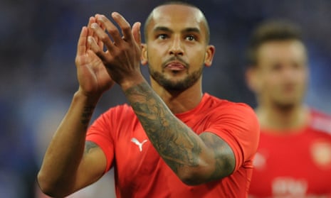 Theo Walcott applauds Arsenal's fans after the FA Cup semi-final win over Reading.