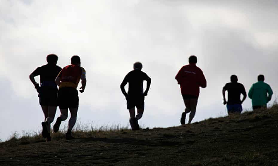Runners out on Arthur's Seat in Edinburgh, Scotland.. Image shot 02/2011. Exact date unknown.