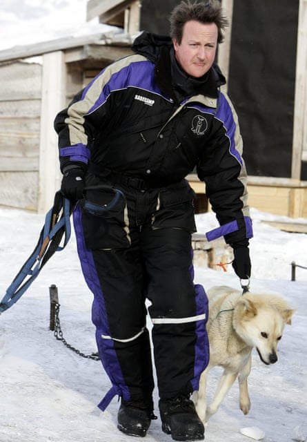 David Cameron organises his husky dogs on the Scott Turner glacier in Svalbard, inside the Arctic circle, Norway.