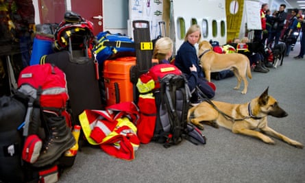 German search dogs and their handlers at the airport in Frankfurt am Main who are flying to Nepal in order to start assisting in relief efforts for the earthquake victims.