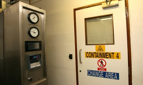 A door on the 'containment floor' of the National Institute for Medical Research, beyond which is the sterile lab where the flu virus samples are kept and tested.
