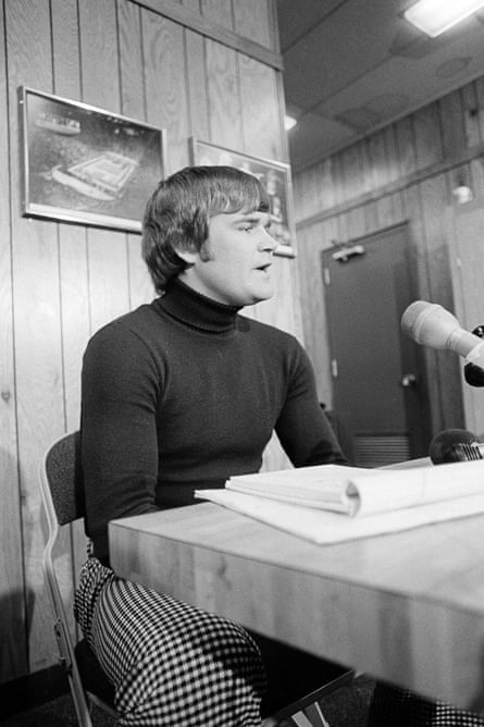 Bob Stewart, player representative of the Cleveland Barons hockey team, shown in a news conference in Richfield, Ohio, Feb. 18, 1977, where he said that the team voted to play against the Colorado Rockies of the NHL in Cleveland and in their following game in Pittsburgh, but that they would become free agents if their financial obligations were not ultimately met in the coming days.