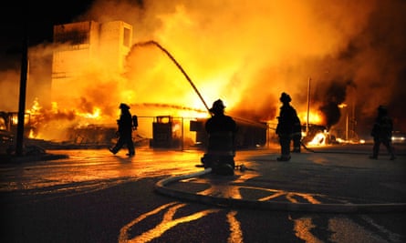 Baltimore firefighters battle a blaze at Gay and Chester Streets.