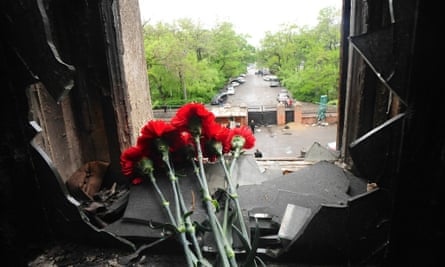 In the days following the fire hundreds went to view the damage inside the Trade Union building and leave memorials.