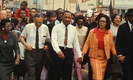 Martin Luther King leading a throng of 25,000 marchers the end of the Selma to Montgomery march, Montgomery, Alabama.