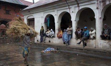 People take shelter at the Pashupatinath temple in Kathmandu, Nepal, one of the buildings to survive the earthquake.