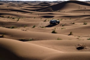A race organiser crosses the desert.