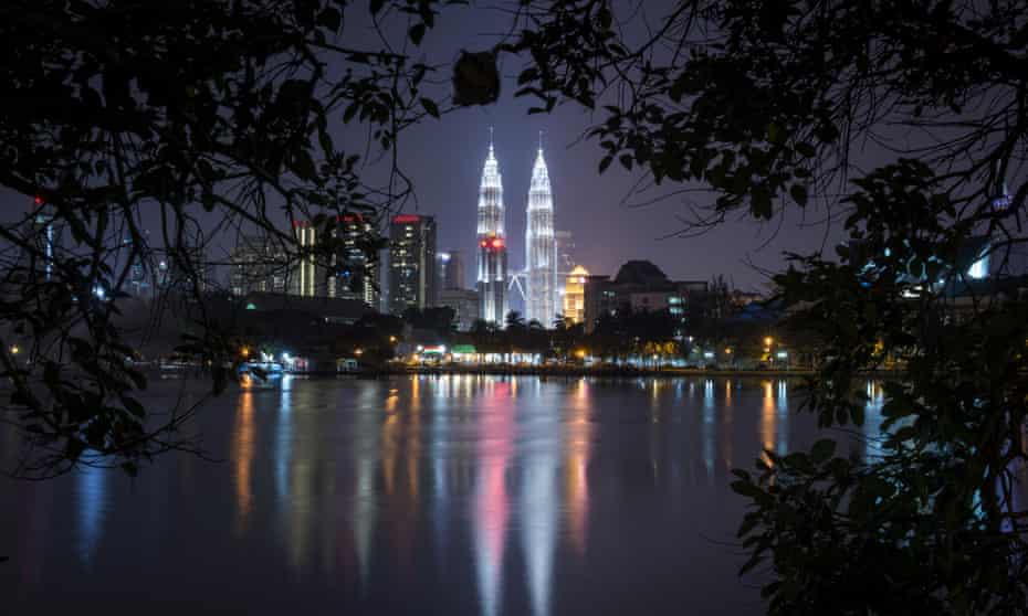 Malaysia's landmark Petronas Twin Towers illuminates the night skyline in Kuala Lumpur. Malaysia's police chief said suspected militants were detained for allegedly plotting to carry out terrorist acts in the country's largest city.