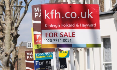 Property sale signs in west London.
